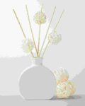 white vase with bamboo ball